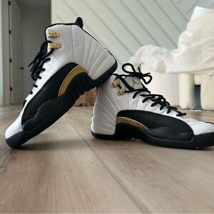 These are Jordan 12’s in a black and white color way size 5 and worn 1 time